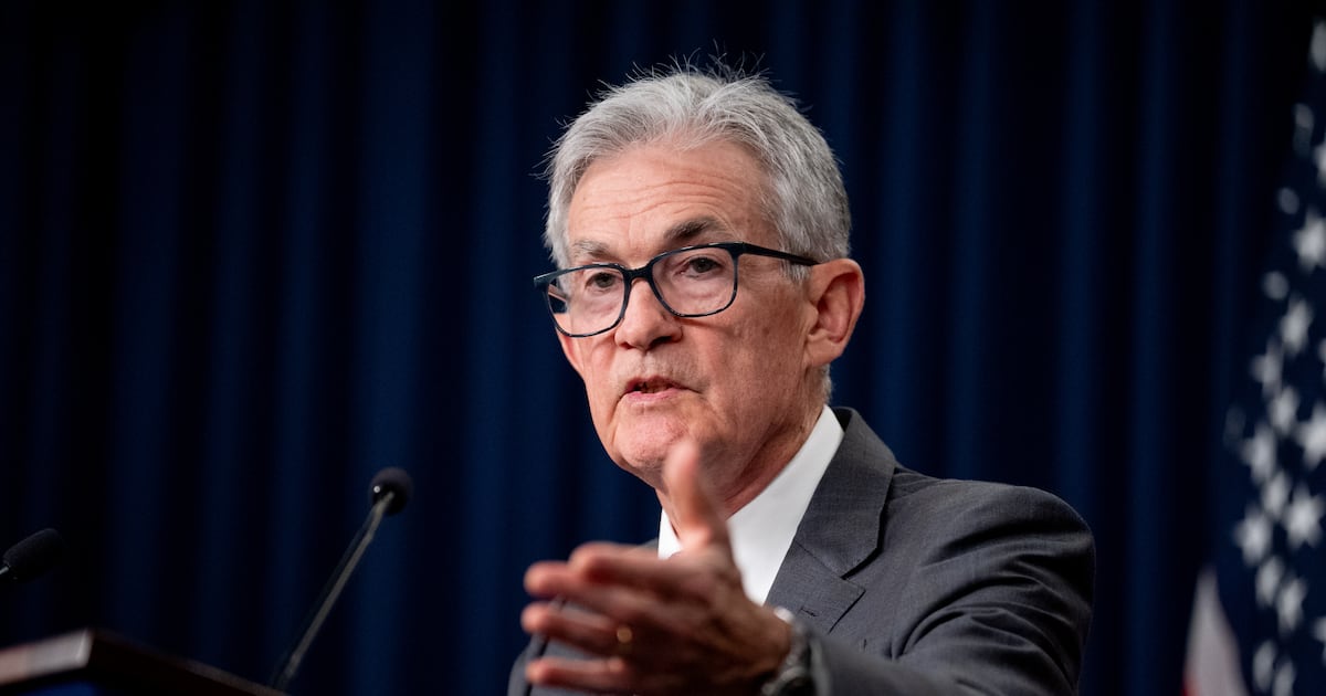 Federal Reserve cuts rates by half point and signals era of easing has begun