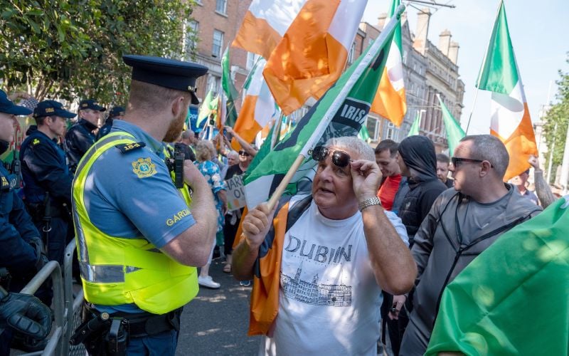 Garda public order units deployed as anti-immigration protest shuts down Dublin city traffic