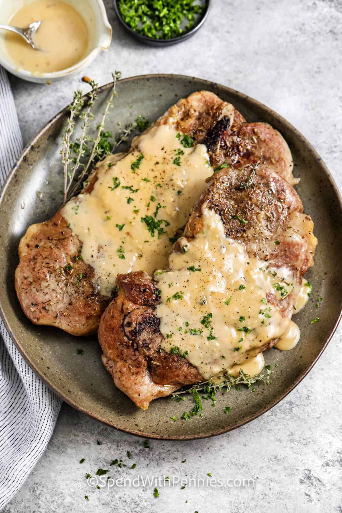 Herbed pork steak with savory cream sauce