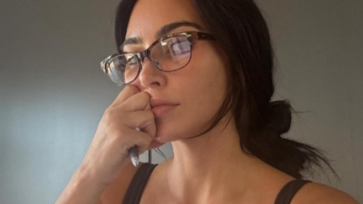 Kim Kardashian, 44, is bra-free with reading glasses on during law studies