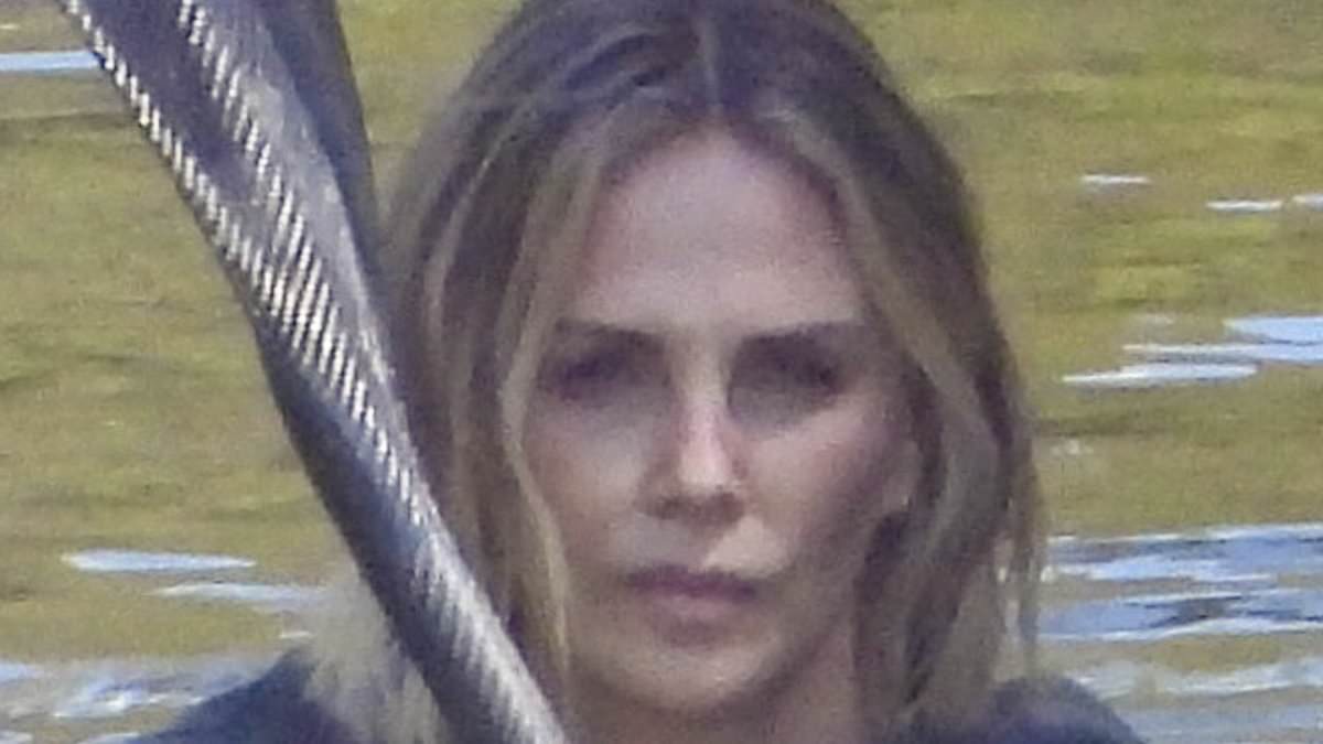 Charlize Theron paddles a kayak while shooting scenes for new Netflix thriller in Australia