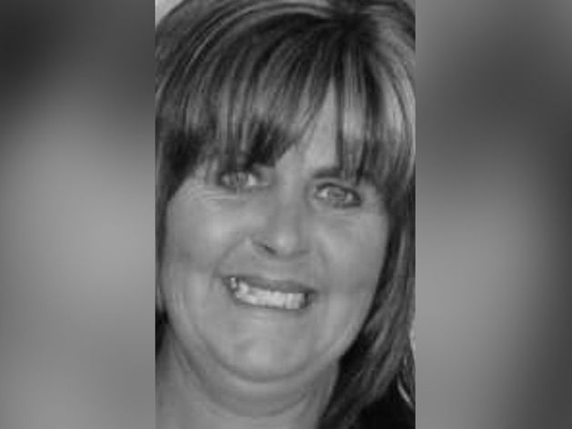 Grandmother dies after parked car rolled down hill and struck her