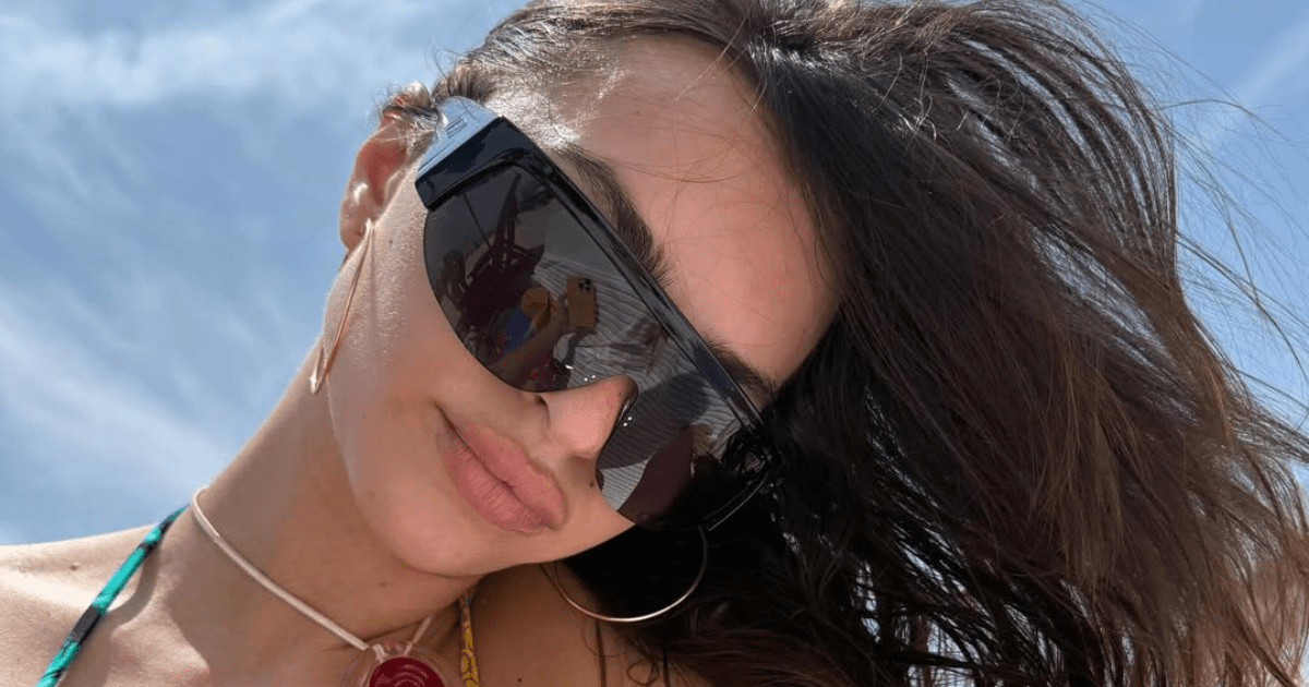 Emily Ratajkowski Heats up Summer in a Plunging Thong Bodysuit
