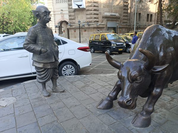The Charging Bull and the Common Man in Mumbai, India