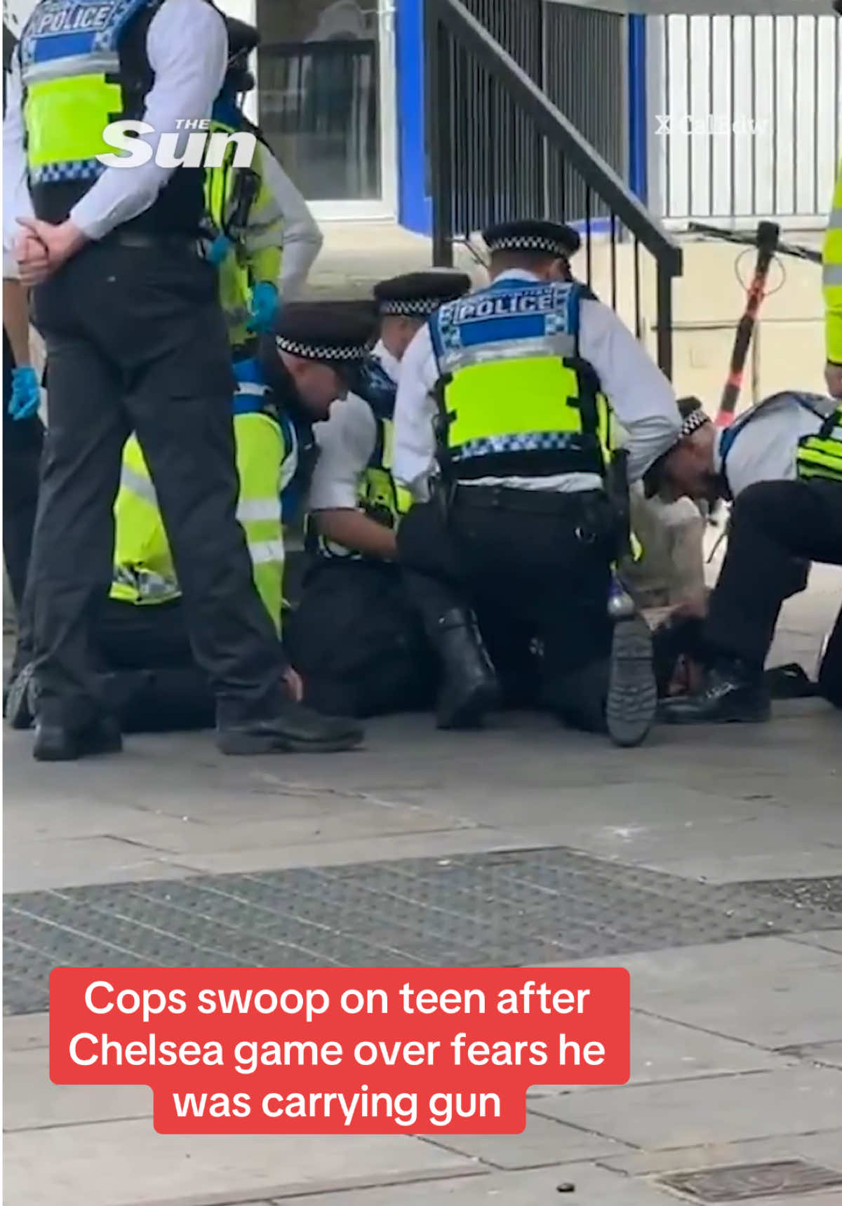 This is the moment a squad of Met cops swoop on a 16-year-old feared to be carrying a gun after today's Chelsea vs Fulham fixture. Cops confirmed that the teen was arrested after being intercepted and searched outside a tube station following the Premier League match. Read the full story above. #Police #Chelsea #Football #Crime #UKNews