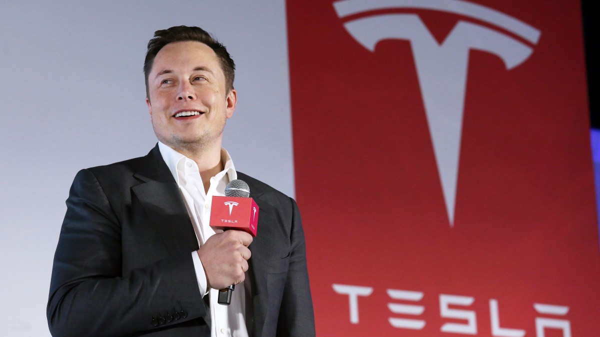 Elon Musk buys $1bn of Tesla shares