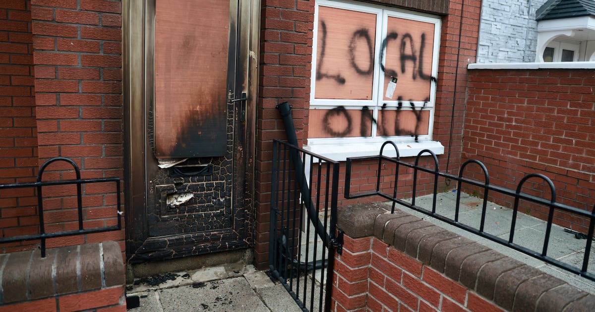 ‘Locals only’ graffiti on house set on fire in Belfast