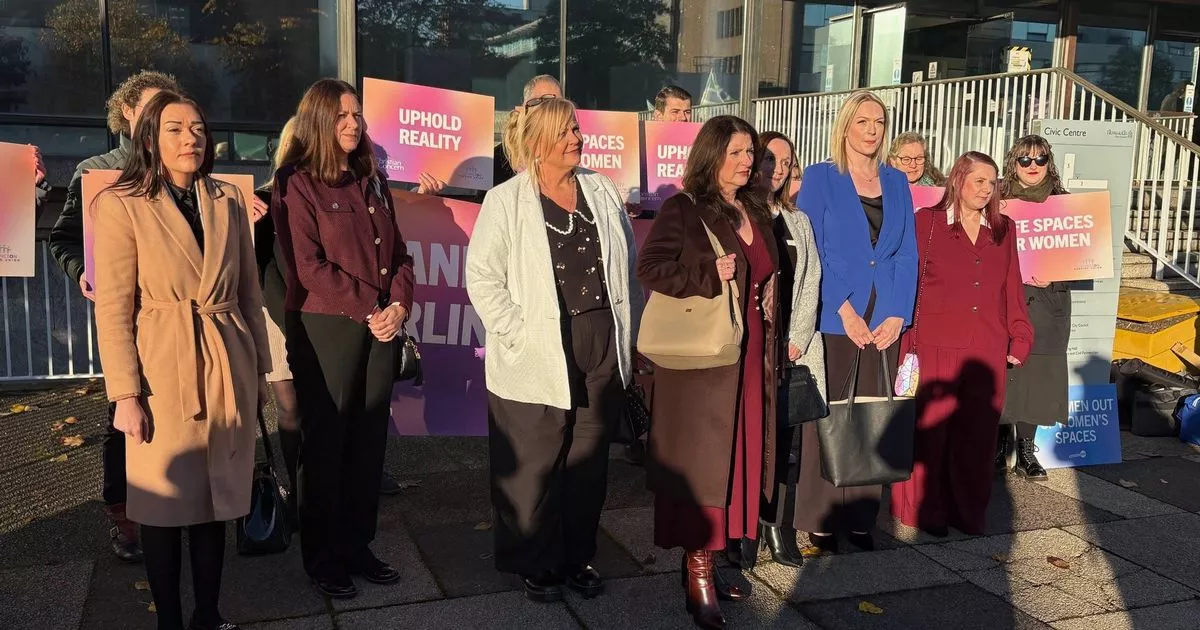 Transgender nurse denies walking around female changing room in boxers