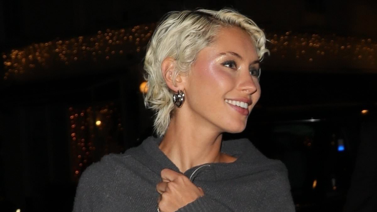 Iris Law puts on a leggy display in a slinky green minidress