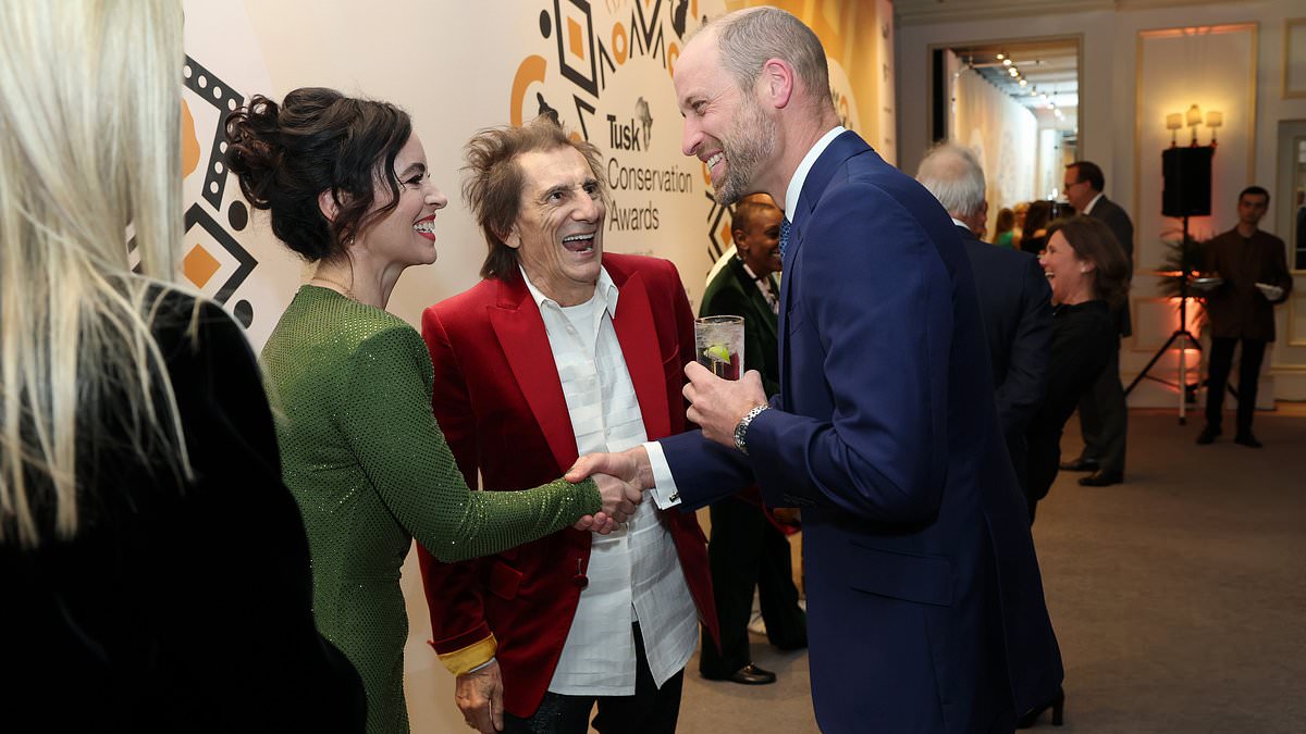 Ronnie Wood and wife Sally share a laugh with Prince William at awards