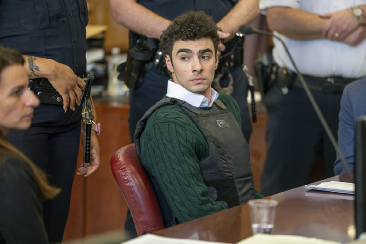 Luigi Mangione Smiles Through Court Hearing While Contesting Critical Evidence Seized at Arrest