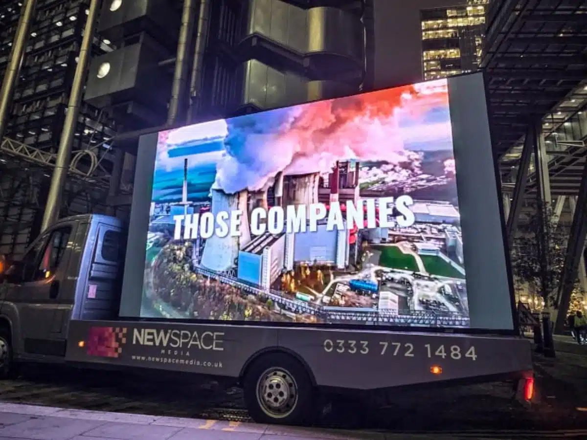 Climate activists screen spoof disaster movie trailers around London