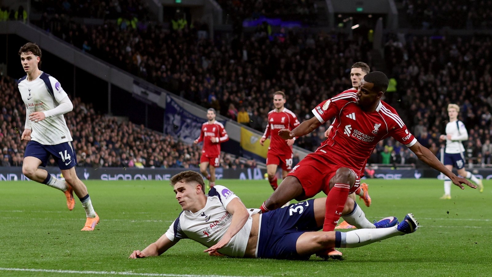 Slot criticises 'reckless' Van de Ven challenge on Isak