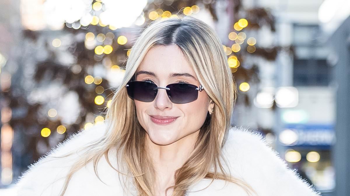 Stranger Things star Natalia Dyer puts on a leggy display in a grey skirt teamed with a faux-fur coat as she steps out in NYC amid the release of the final season