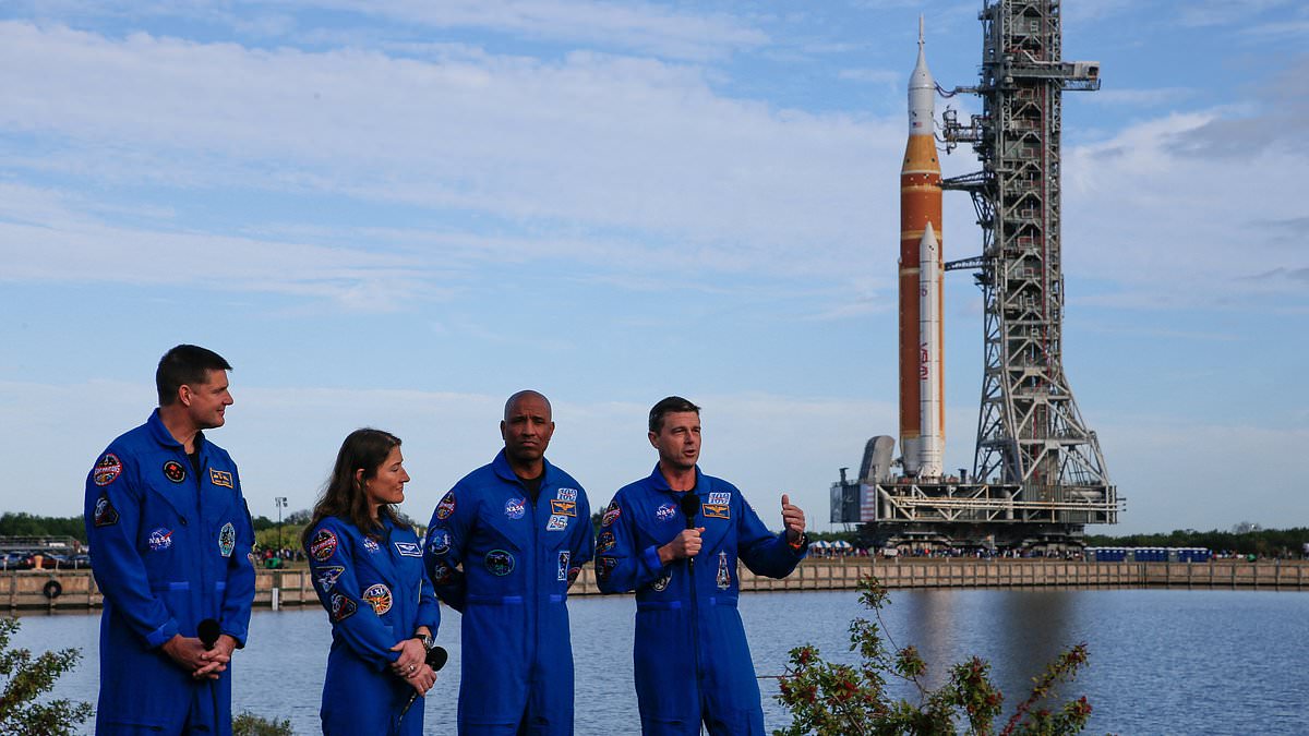 NASA delivers 11MILLION lbs rocket to launch pad as countdown to historic moon mission begins