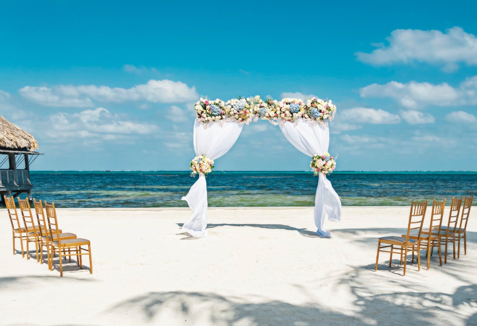 How To Plan A Destination Wedding Without Breaking The Bank, According To An Expert