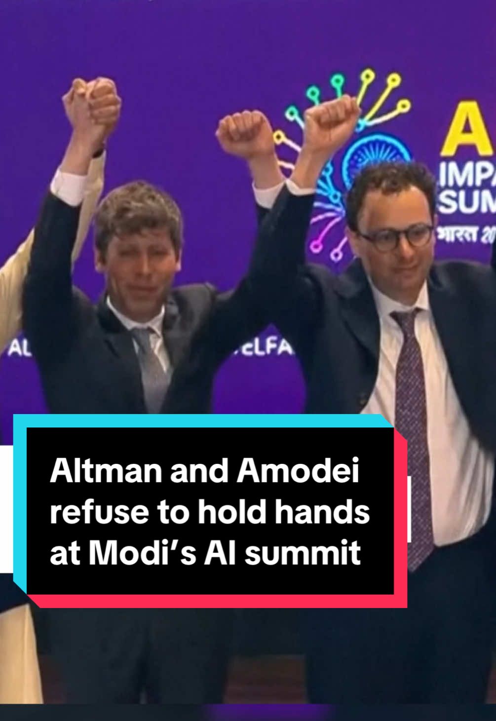Sam #Altman and Dario #Amodei, CEOs of rivals #OpenAI and #Anthropic, refused to hold hands at an AI summit in #India. The two tech chiefs were positioned next to each other in a lineup of business and political leaders, and instead stood with their hands in the air and avoided eye contact.