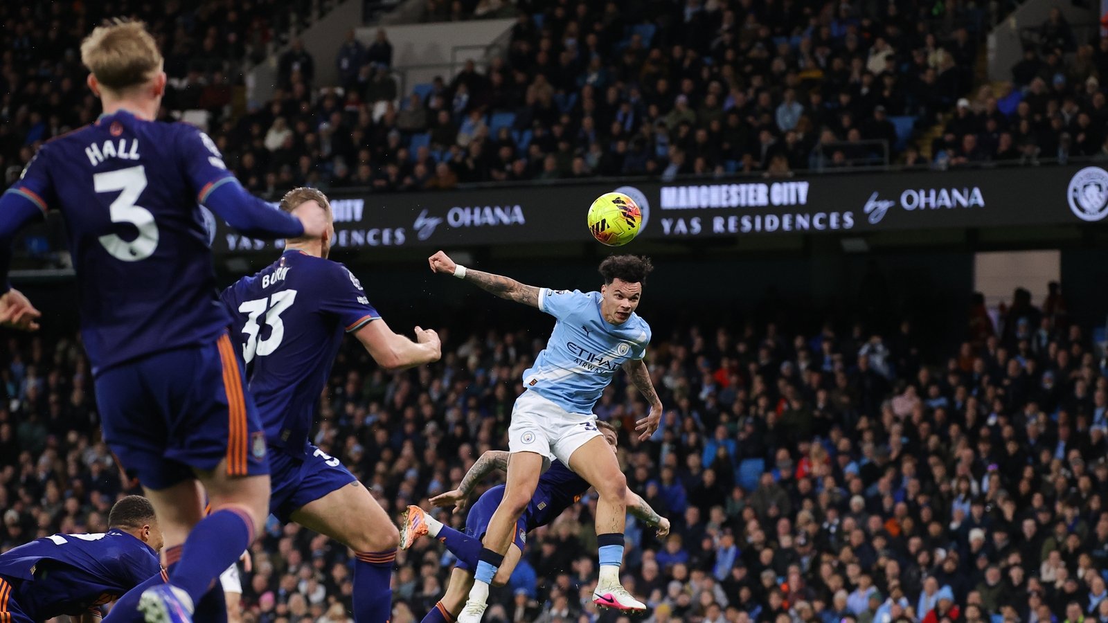 Man City close in on Arsenal after nervy Newcastle win