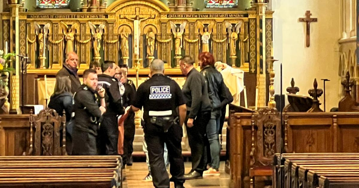 Police at Reading Minster Church after man arrested