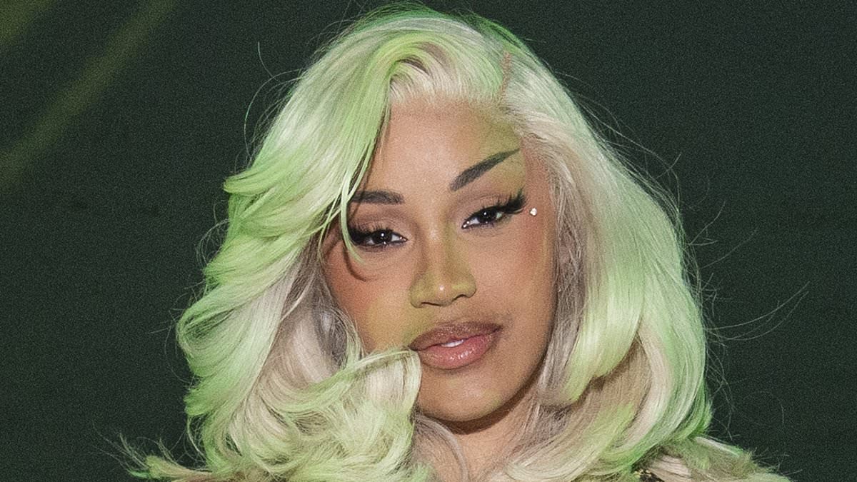 Cardi B sizzles in busty snakeskin bodysuit after threatening to cancel Atlanta show over 'disrespectful' employees