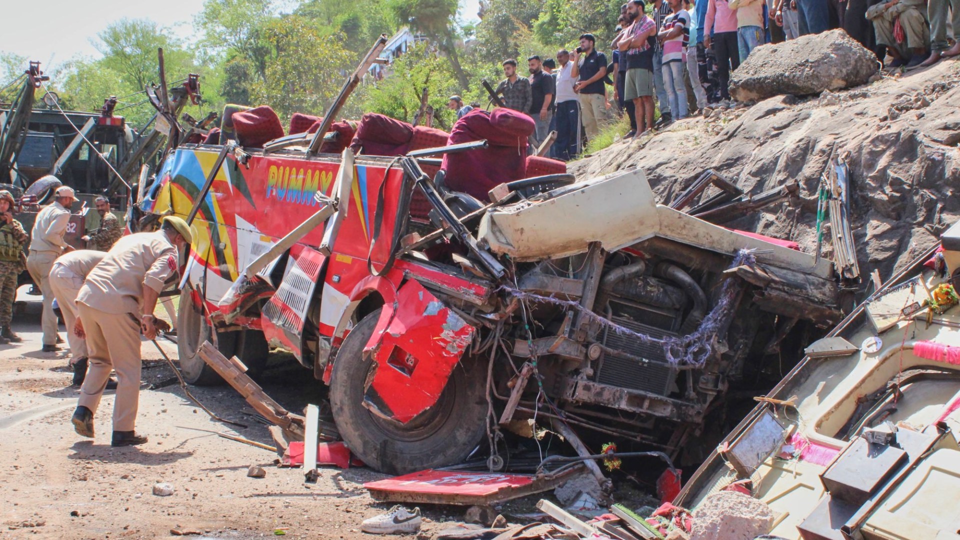At least 21 dead and 45 people injured after bus plummets 100ft down rocky slope
