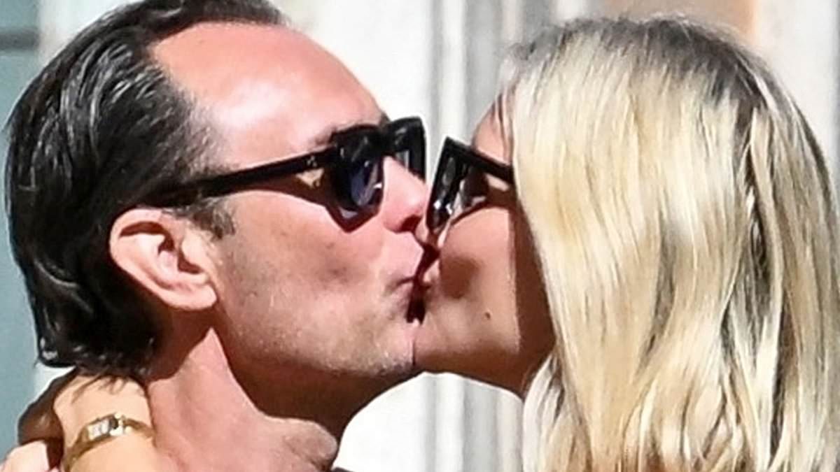 Jude Law and his wife Philippa Coan prove they're still very much in love as they passionately kiss before he cheekily grabs her bottom during romantic day out in Rome