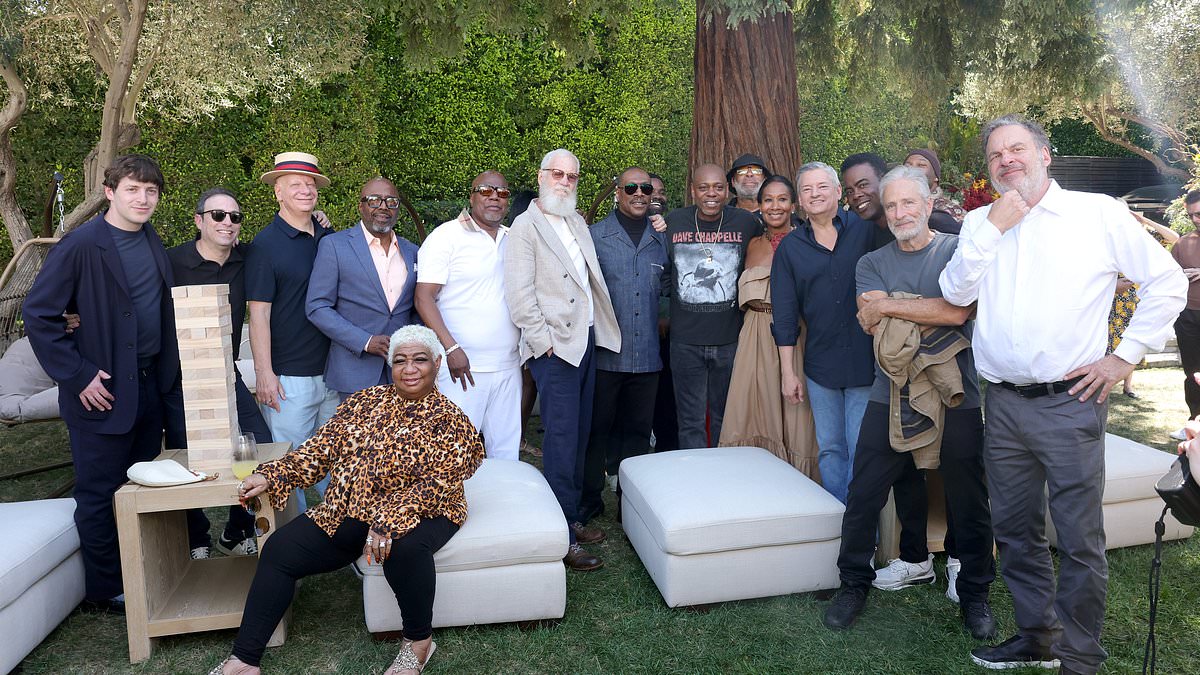 How many famous comedians can you name in this photo with Eddie Murphy?