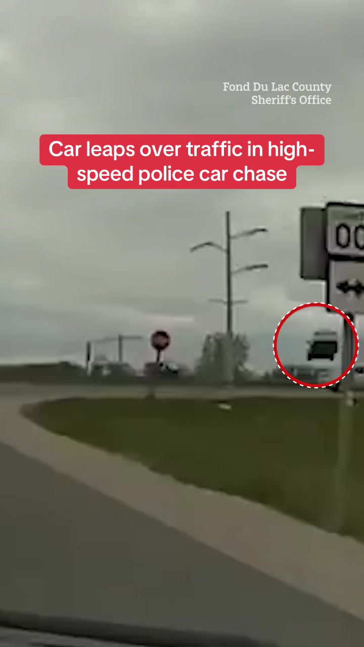 This is the moment a driver launched his car into the air in a desperate attempt to get away from a high-speed chase with cops. In shocking dashcam footage, police were seen pursuing the man in a white vehicle as the chaos unfolded. Click the link above to read more. #PoliceChase #DashCam #Crash #ShockMoment