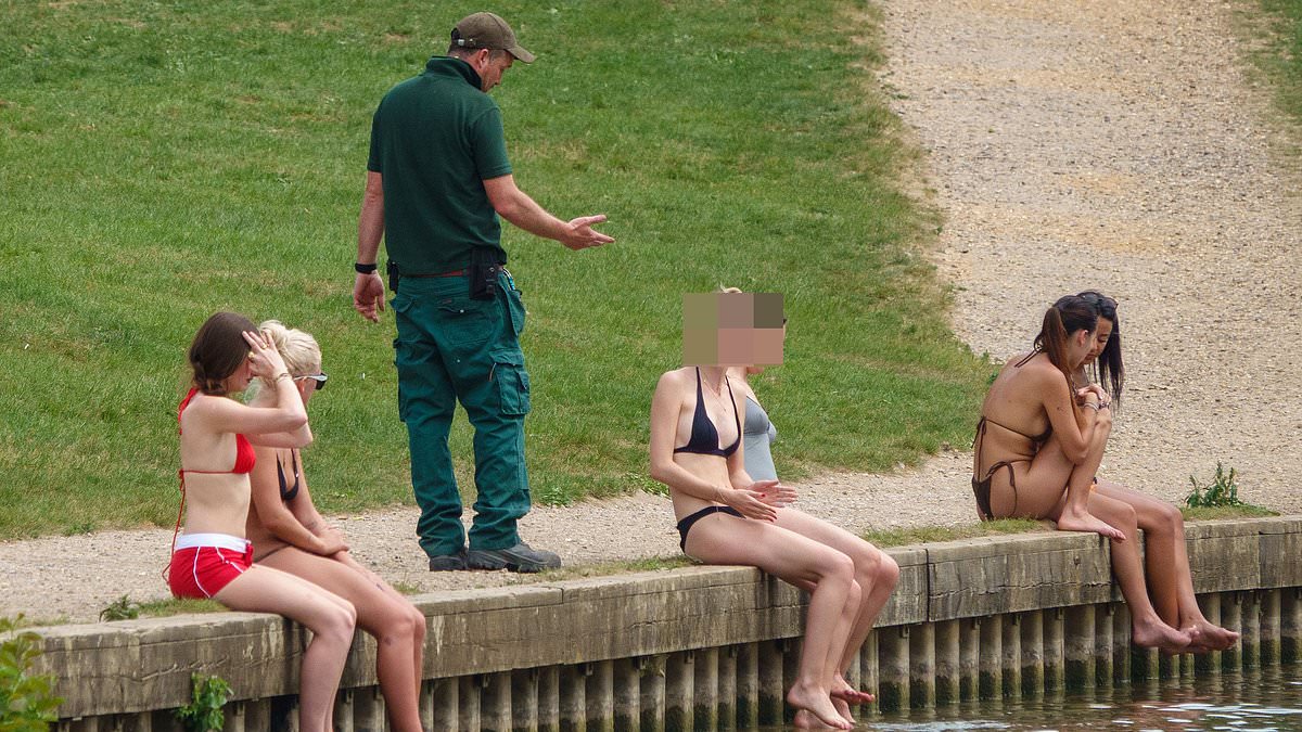Crackdown on 'selfish' sunseekers: Hampstead Heath rangers install 'no swimming' signs after crowds ignore bird pond ban to take a dip during heatwave