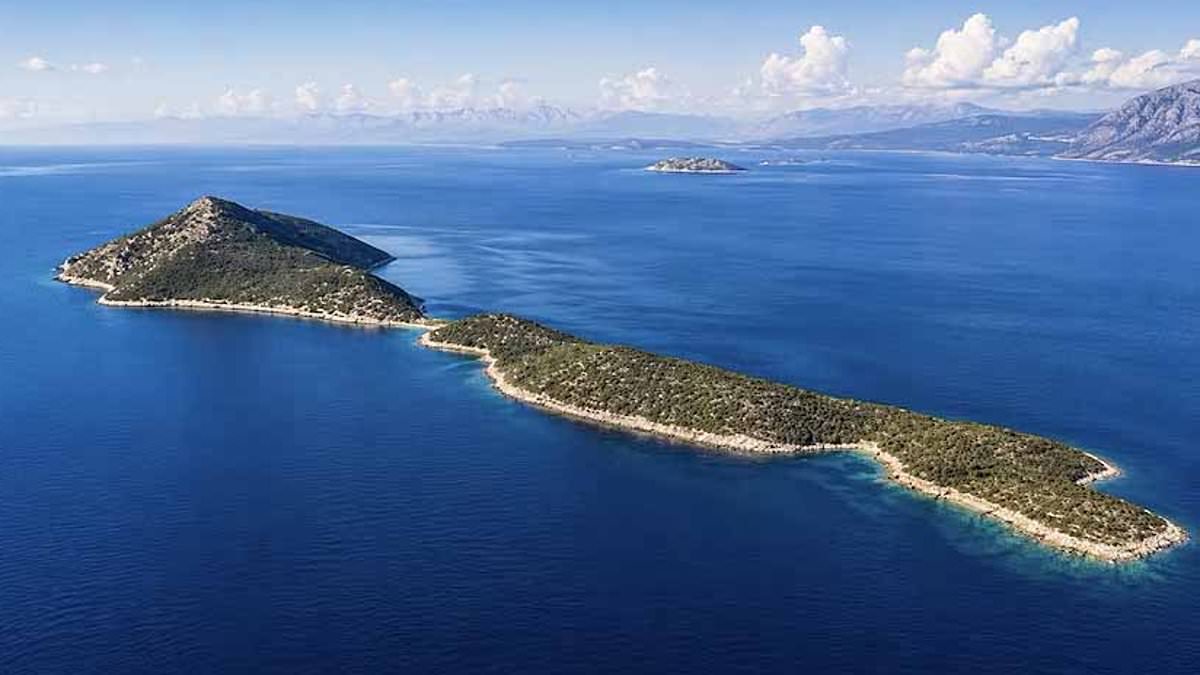 This private, 243-acre Greek island is on sale for half the price of a London flat - but there's a costly catch