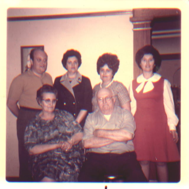 My Grandparents with their adult children. The lady in the red dress is my mother who will be having her 101st birthday in a few months. Photo taken in 1972 in SE Wisconsin.