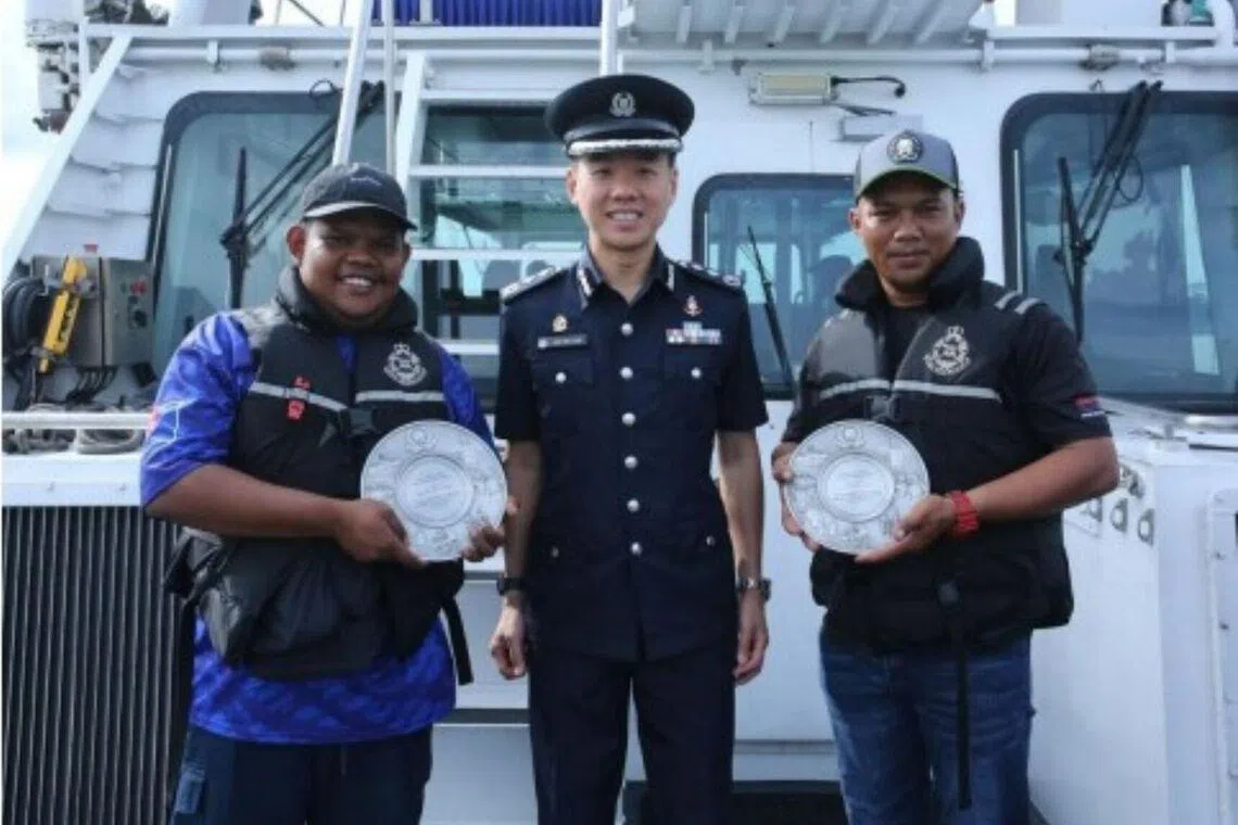 2 Malaysian men who helped Singapore police recover stolen boat get public spiritedness award