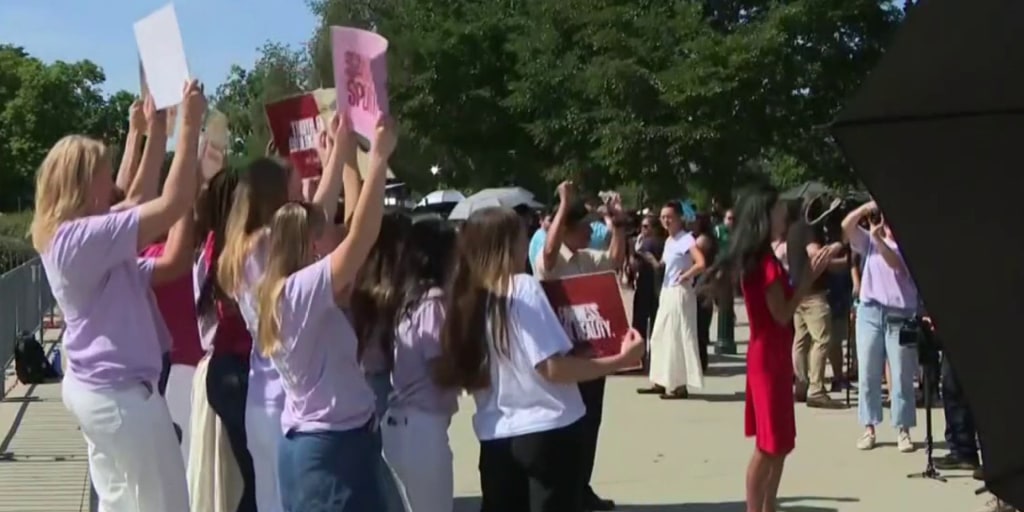 Groups outside the Supreme Court celebrate state bans on transgender athletes