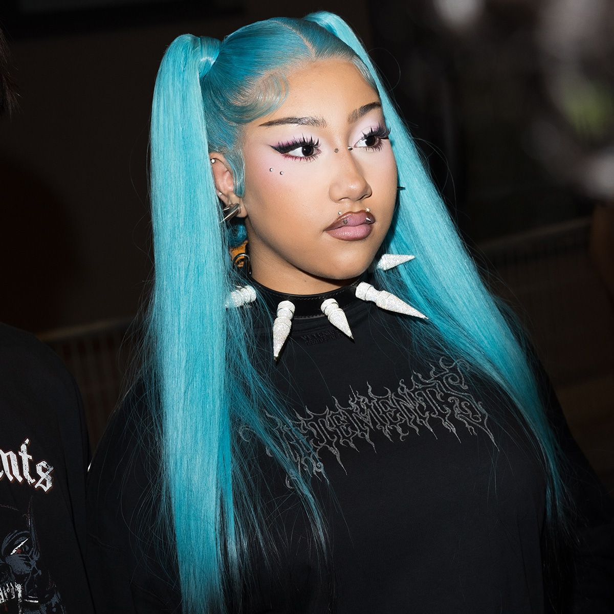 North West Shows Off Blue Lips and Face Piercings in New Video