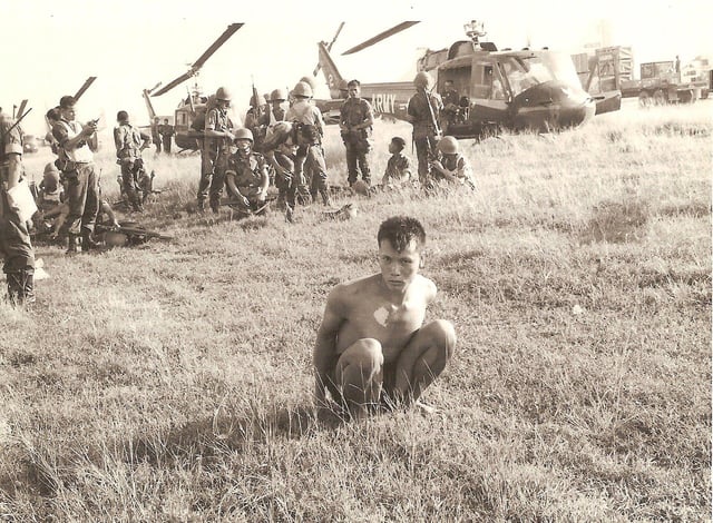 ARVN troops with suspected VC member, 1965. [1920x1412]