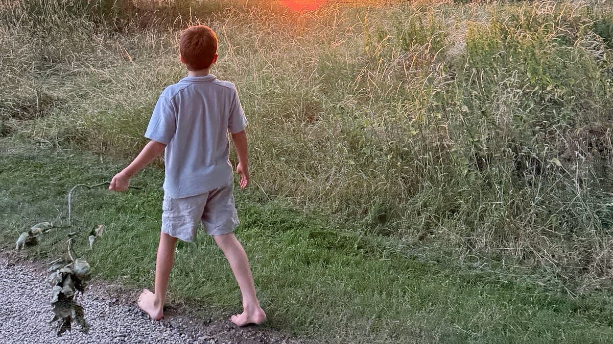 Following in his mother's footsteps! How Archie has adopted Meghan's love of going barefoot - as he strolls through the countryside without shoes on during European holiday