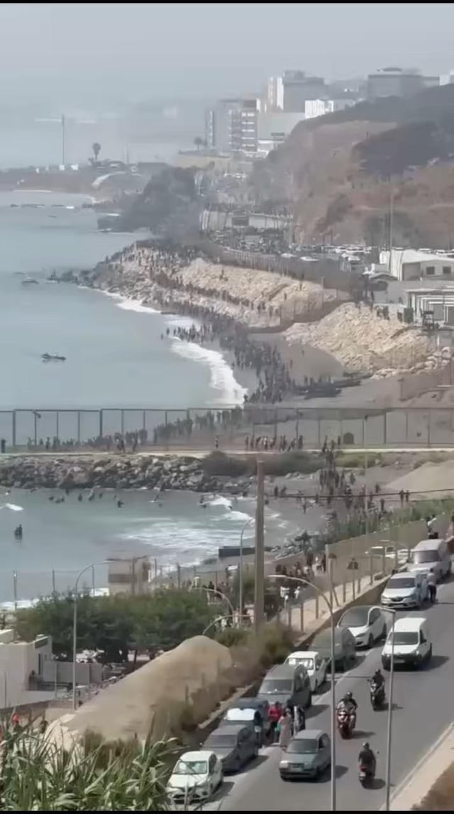 Thousands of Moroccans rushed the border with Spain in Ceuta and then broke out of the detention center