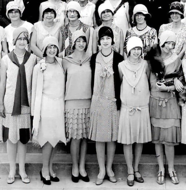 Teenagers dressed for a high school dance in the 1920s [2203x2048]