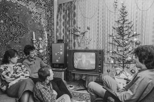 A Soviet family watching U.S. President Ronald Reagan's New Year address on television, (1988), Moscow, Russian SFSR. Photograph Valentin Mastyukov & Alexander Chumin [1200x800]