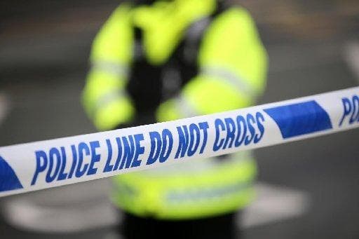 Woman charged with murder after man found dead at address