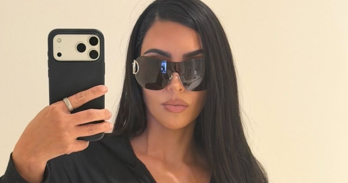 Kim Kardashian's Unbuttoned Martine Rose Jacket Plunges Low for Broc Shot