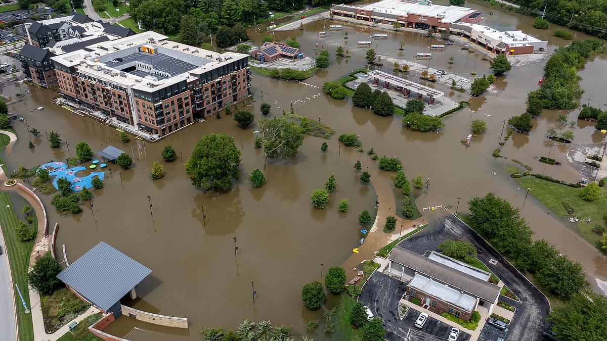 Six dead, including 4-year-old boy, as hundreds rescued in 'once-in-a-lifetime floods' in Indiana as raging waters engulf homes and threaten to swallow towns
