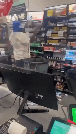 Guy gets whopped robbing a 7/11