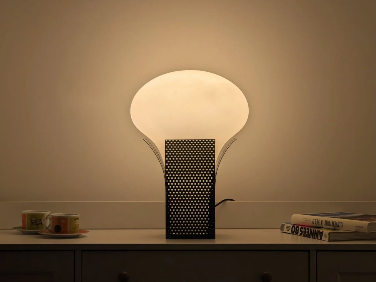Pandora Lamp Reveals a Hidden Glow Through Perforated Steel