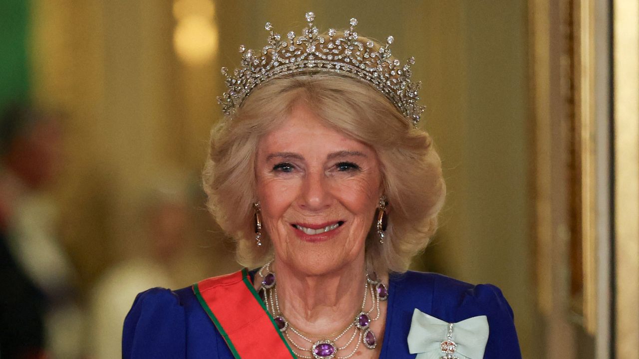 Queen Camilla sparkles in the Queen Mother's art deco bracelets at the Oman state banquet