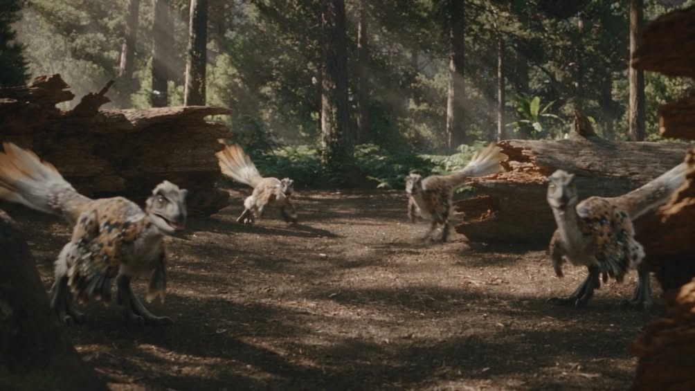 Feathered Theropod Overwhelms Swarming Raptor Pack An exciting forest battle as an apex feathered dinosaur takes on an a...